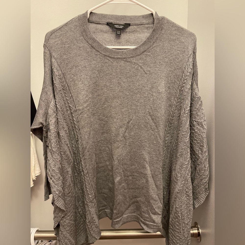 Brand new Vera Wang sweater/poncho. Lightweight. Size S-M (fits oversized).